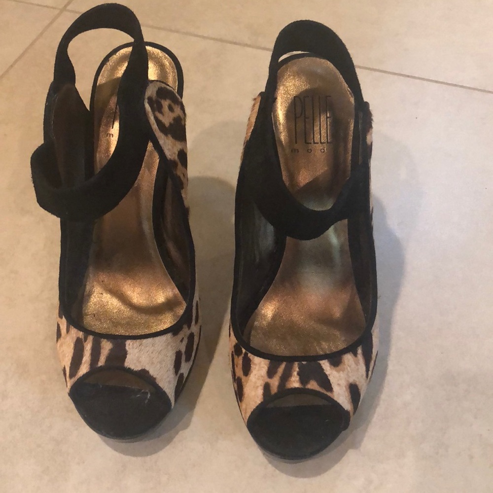 Pelle moda leopard print strappy heels.